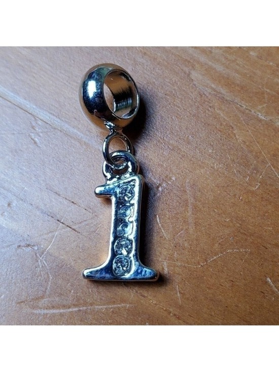 Jewelry - NWOT charm, silver colored number 1 with clear stone embellishments